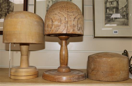 Three turned wood hat stands